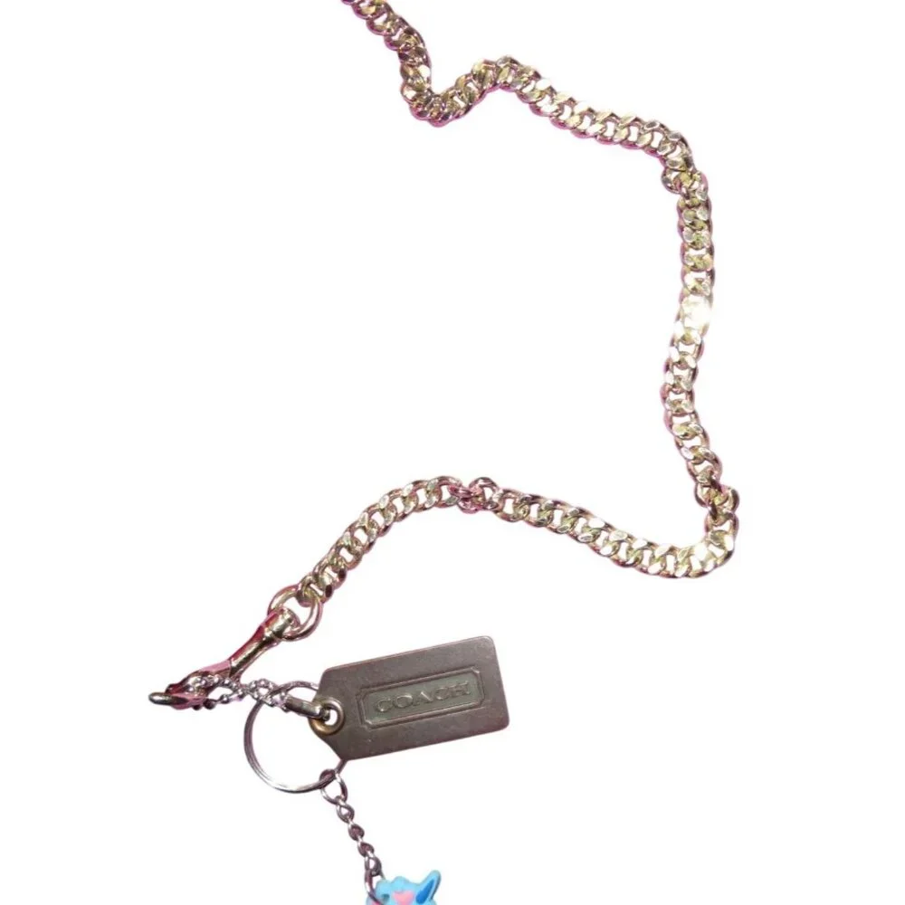 Coach Pink Cross grain Leather Mini Ruby Turn Lock Crossbody Handbag